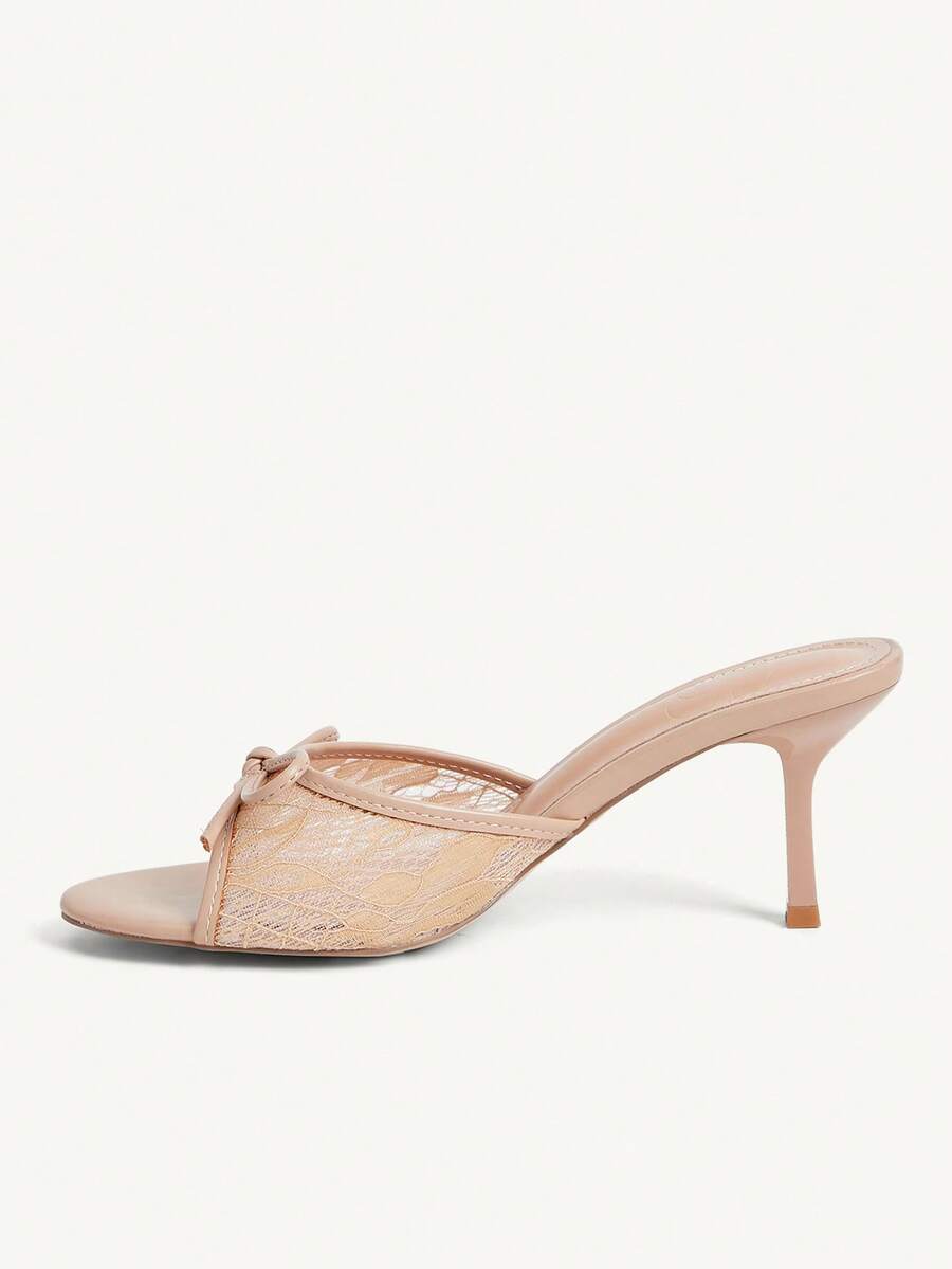 Open toe high heel slide sandals featuring lace details and a bow accent on the upper strap.