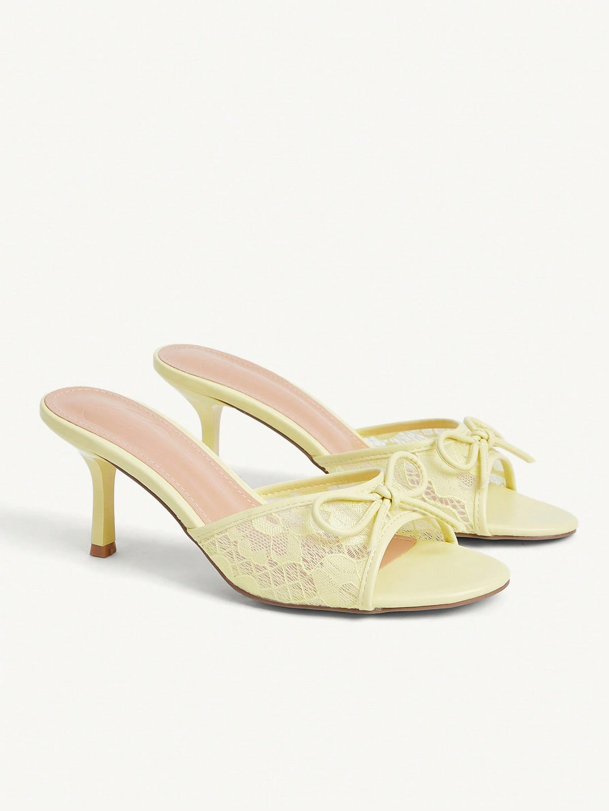 Open toe high heel slide sandals featuring lace details and a bow accent on the upper strap.