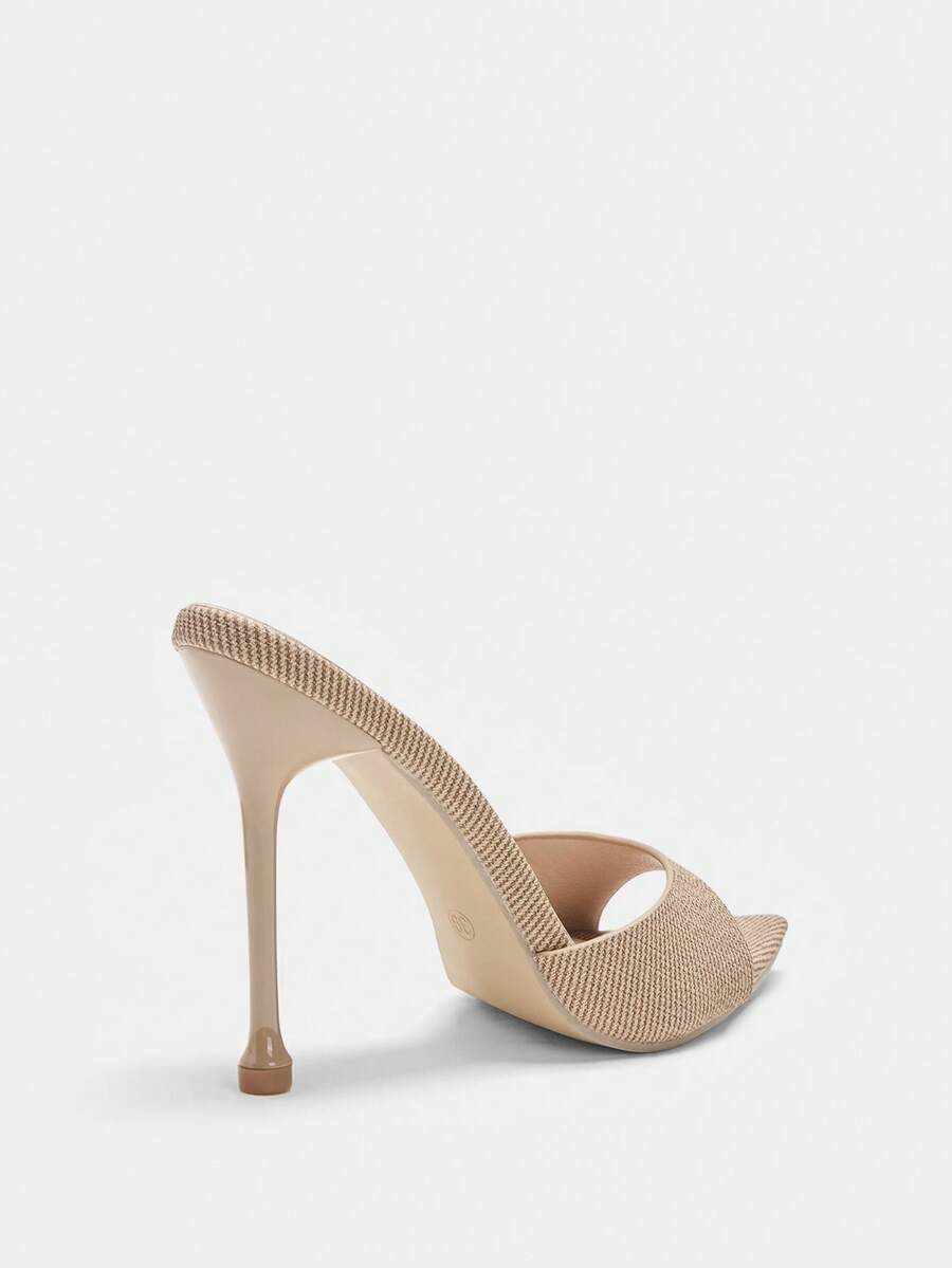 Pointed toe bowknot stiletto high heel mule sandals in white featuring a sleek slip-on open back design