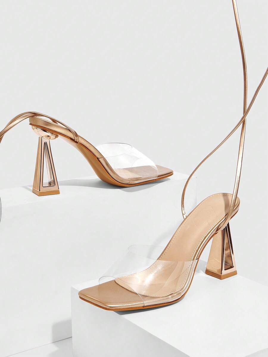 Pair of champagne square toe chunky high heel sandals featuring an open toe design and an adjustable ankle buckle strap.