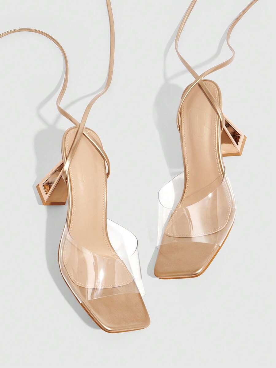Pair of champagne square toe chunky high heel sandals featuring an open toe design and an adjustable ankle buckle strap.
