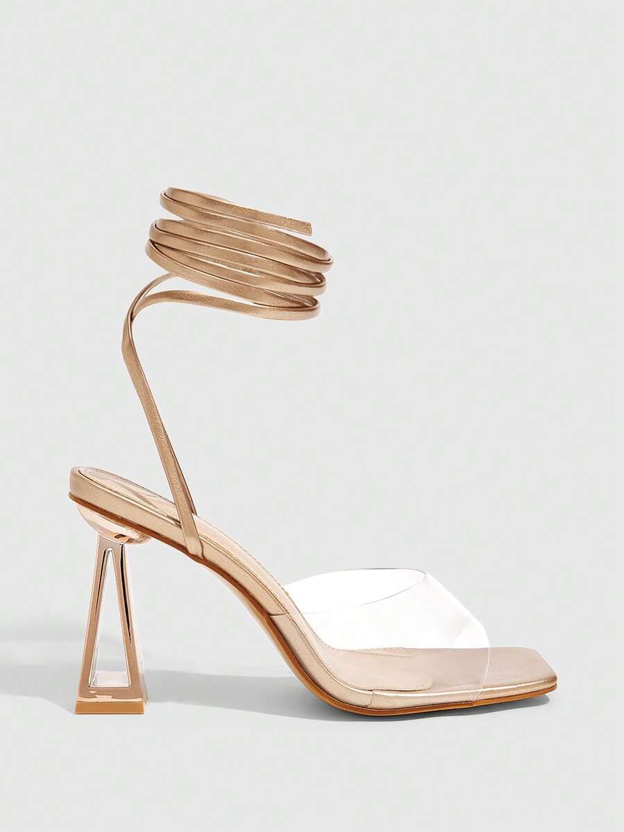 Pair of champagne square toe chunky high heel sandals featuring an open toe design and an adjustable ankle buckle strap.