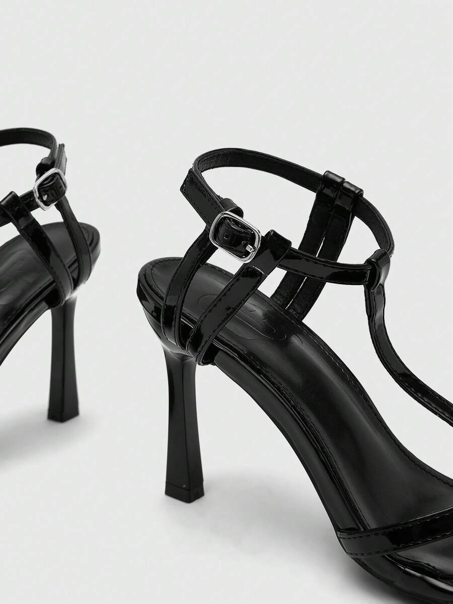 Milk apricot open toe high-heeled sandals with adjustable ankle buckle strap and stiletto heel for ladies.