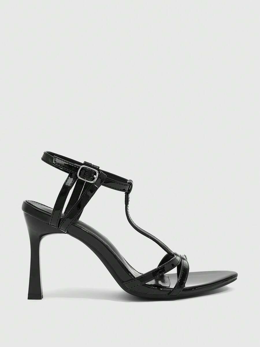 Milk apricot open toe high-heeled sandals with adjustable ankle buckle strap and stiletto heel for ladies.