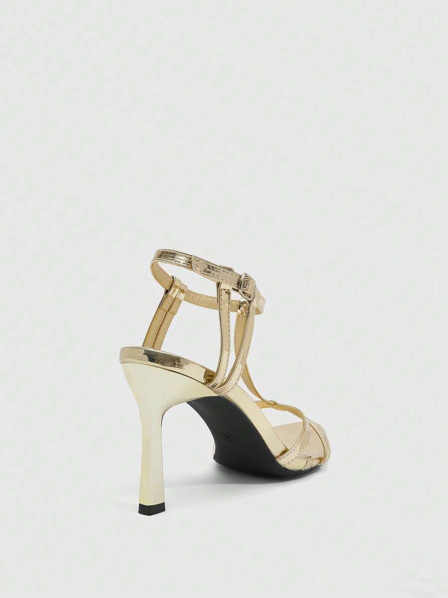 Milk apricot open toe high-heeled sandals with adjustable ankle buckle strap and stiletto heel for ladies.