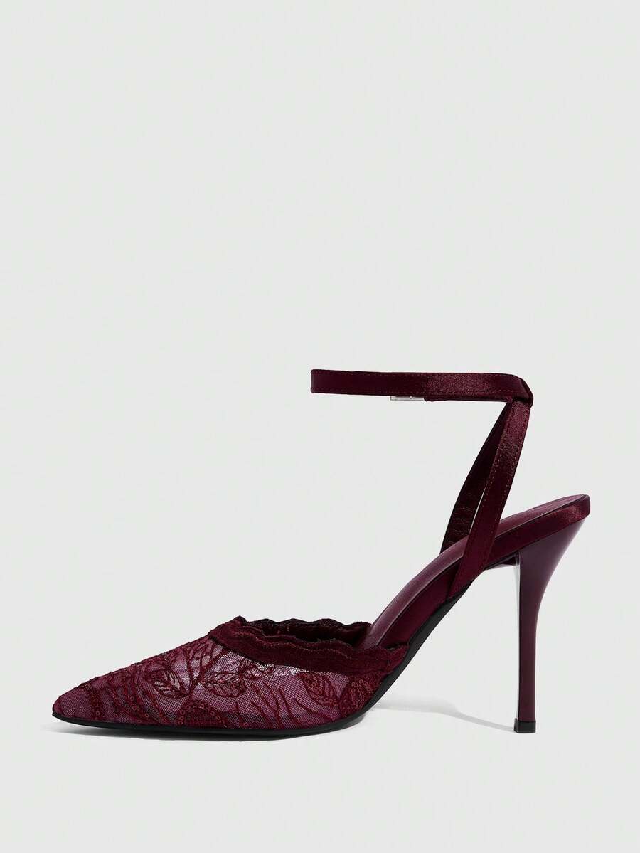 Women's stiletto high heel shoes featuring an elegant buckle detail and ankle strap slingback design.