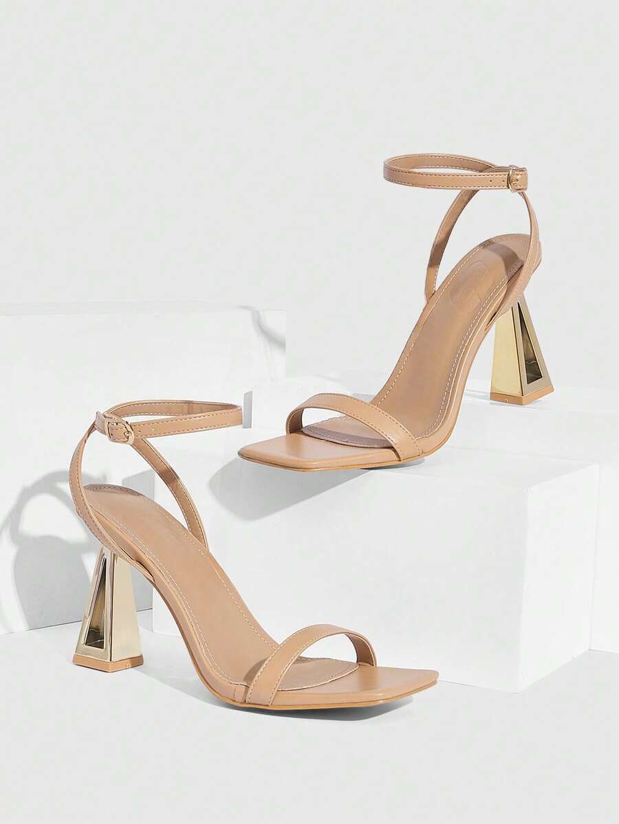 Pair of champagne square toe chunky high heel sandals featuring an open toe design and an adjustable ankle buckle strap.