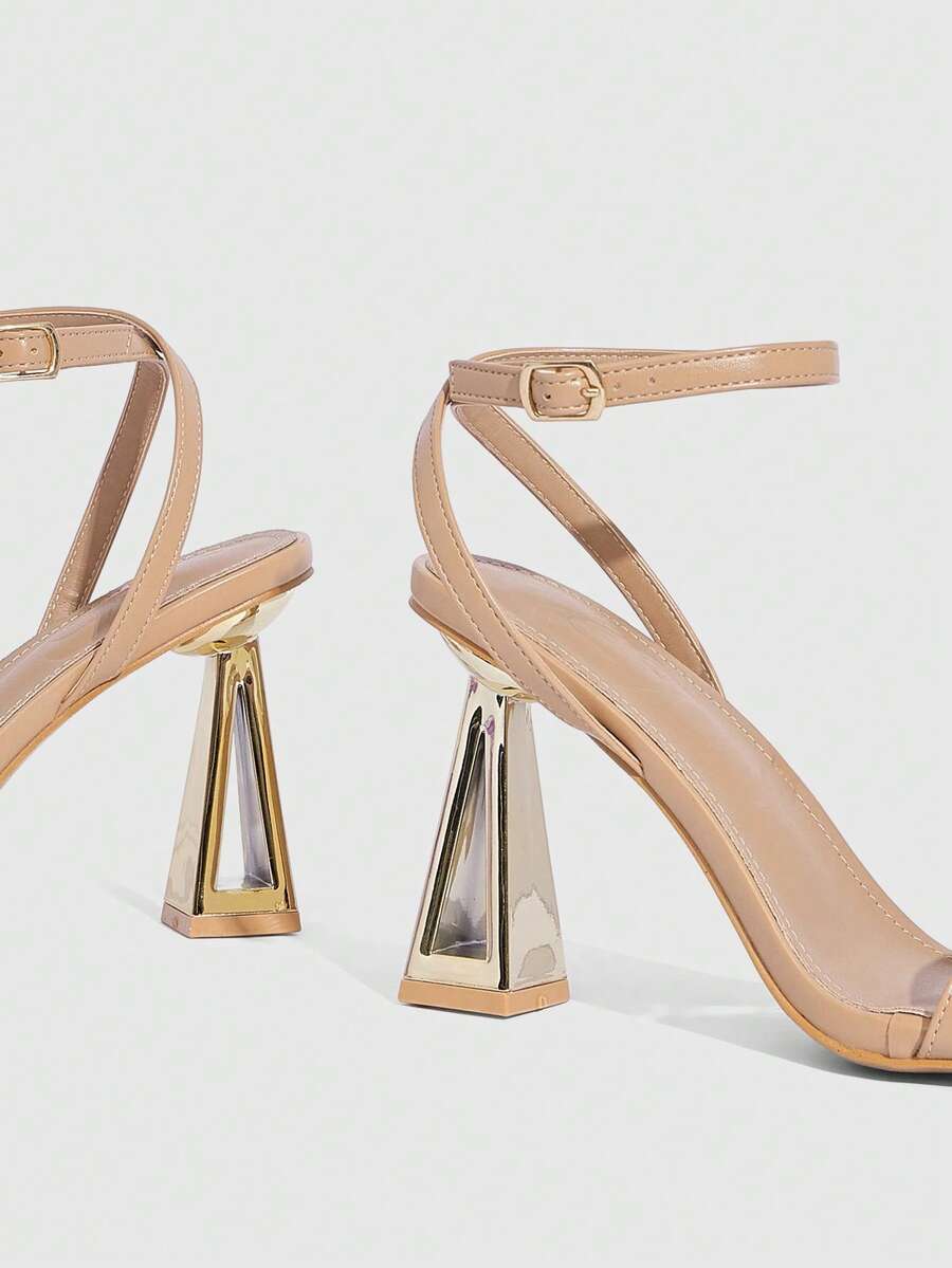 Pair of champagne square toe chunky high heel sandals featuring an open toe design and an adjustable ankle buckle strap.