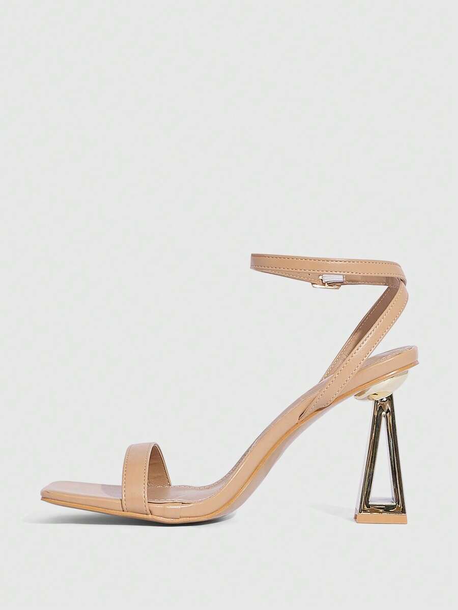 Pair of champagne square toe chunky high heel sandals featuring an open toe design and an adjustable ankle buckle strap.