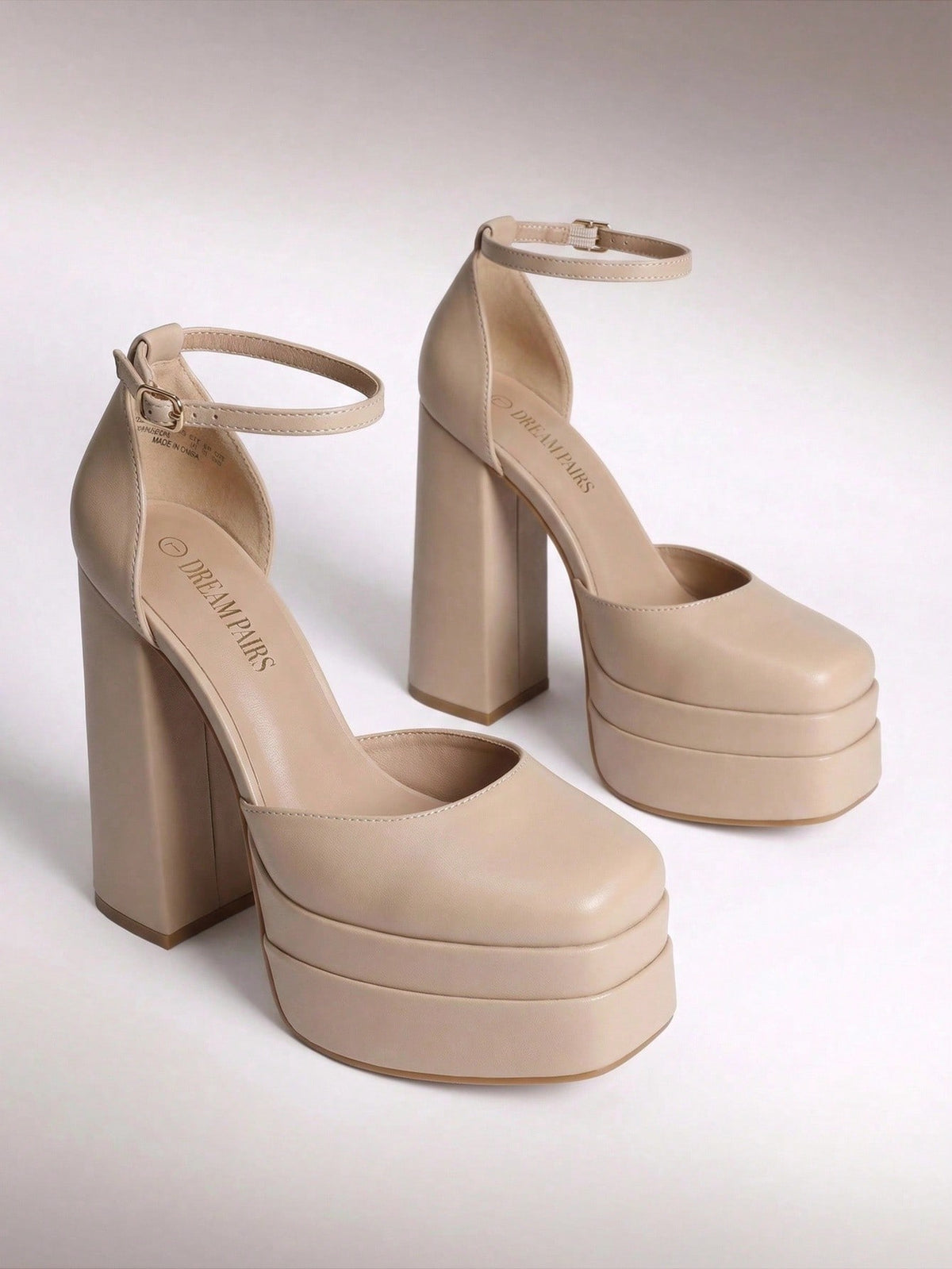 Women's ultra high platform block heels in smooth PU leather with square toe and adjustable buckle ankle strap.
