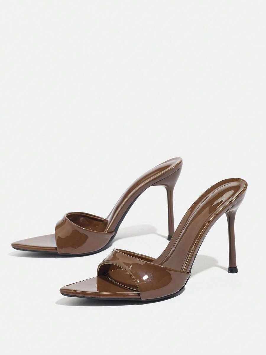 Women's elegant open toe high heel party mules featuring sleek stiletto heels and a slip-on design.