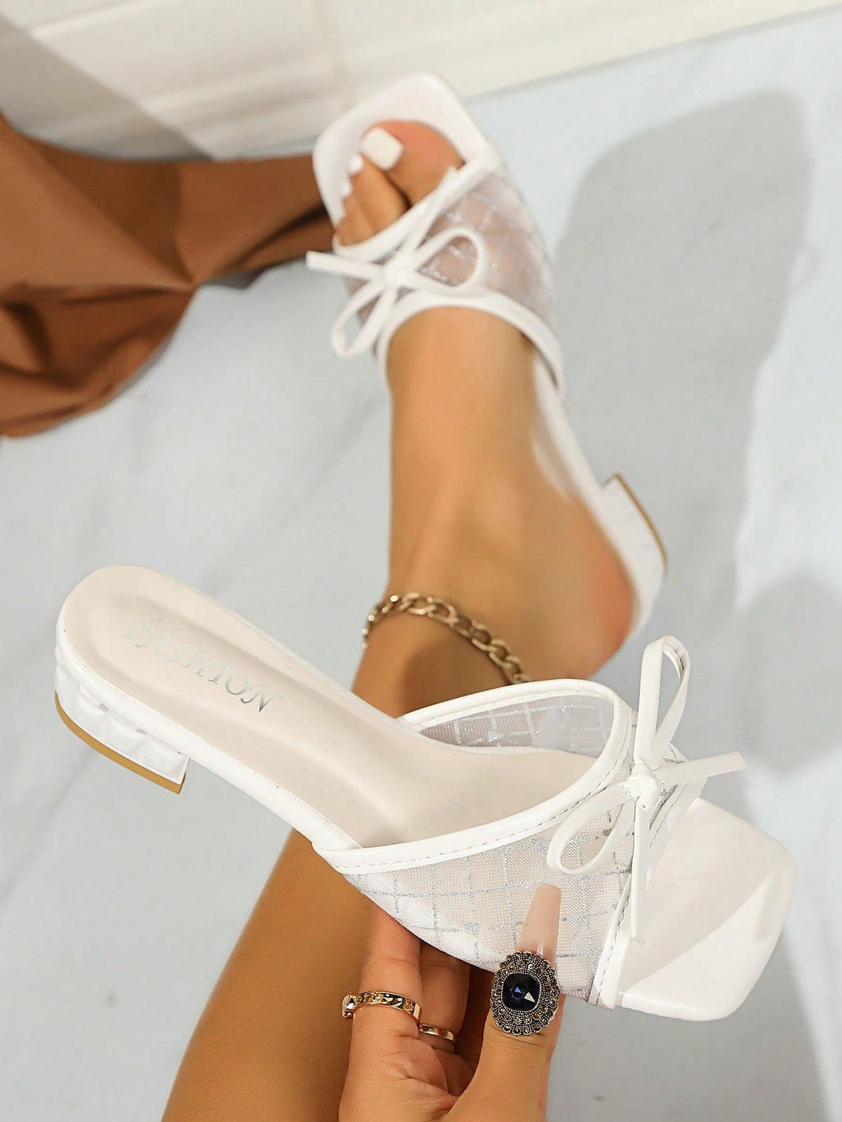 Square toe thin heel thong sandals for women featuring an open toe, bowknot detail, and slip-on slingback design.