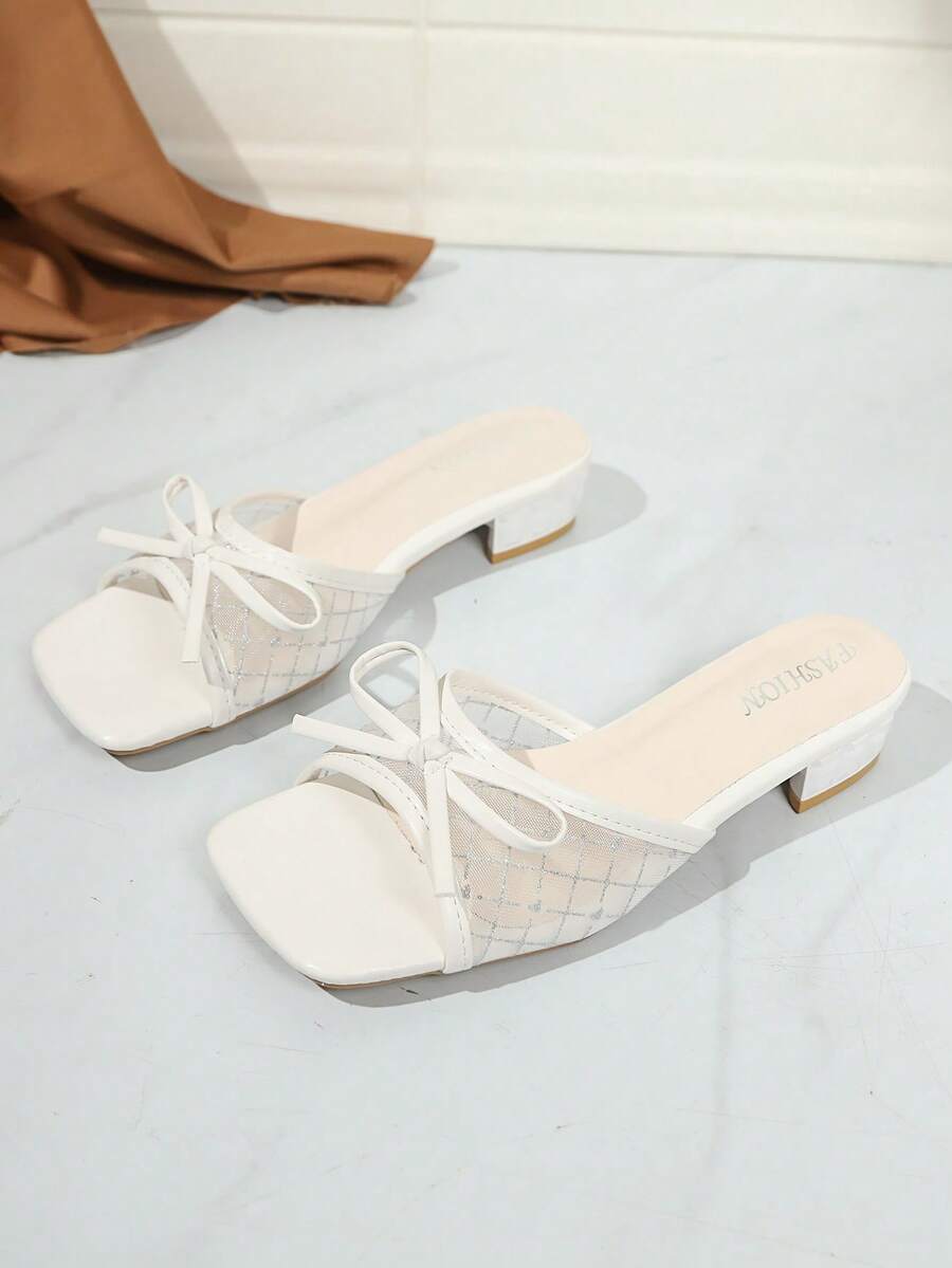 Square toe thin heel thong sandals for women featuring an open toe, bowknot detail, and slip-on slingback design.