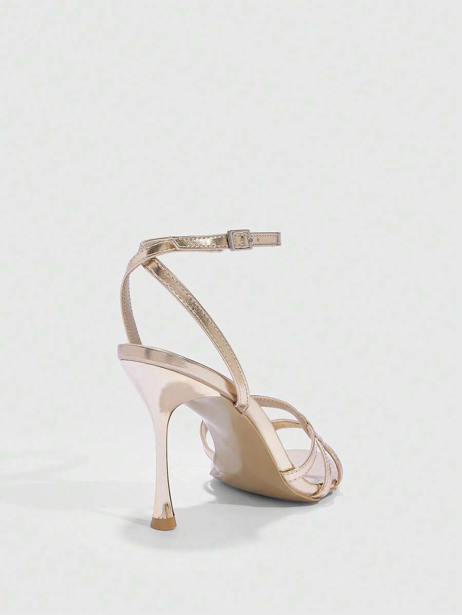 Women's open round toe high heel sandals with thin stiletto heel, hollow strap design, and ankle buckle closure.