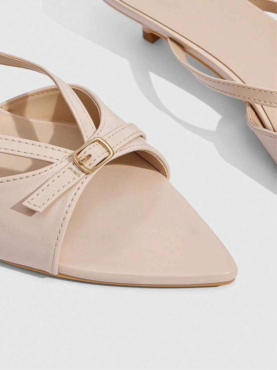 Pointed toe high-heeled slippers in PU leather with decorative buckle detail and low kitten heels for women.