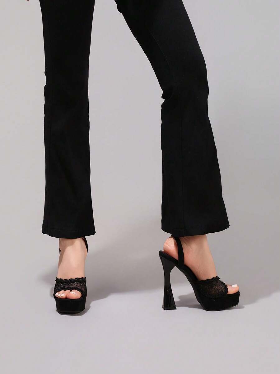 Lace embroidered open toe high heel sandals featuring a chunky square heel, platform wedge, and ankle strap buckle closure.
