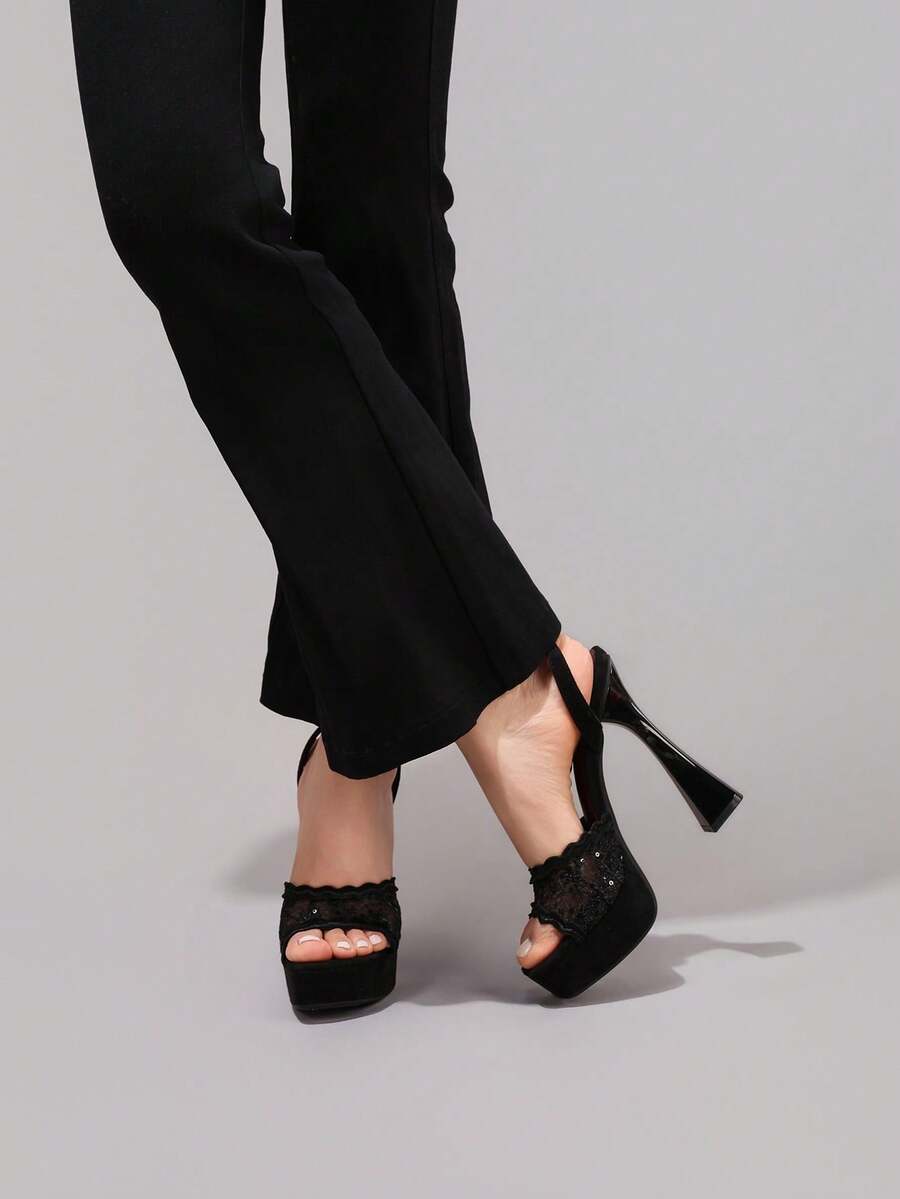 Lace embroidered open toe high heel sandals featuring a chunky square heel, platform wedge, and ankle strap buckle closure.