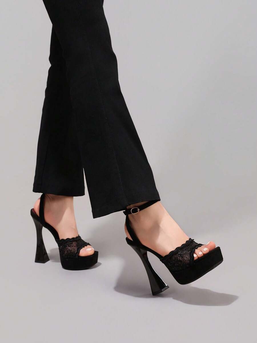 Lace embroidered open toe high heel sandals featuring a chunky square heel, platform wedge, and ankle strap buckle closure.