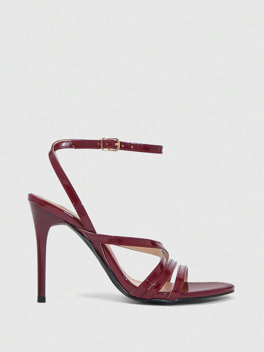 Women's square toe high heel sandals featuring crystal embellishments and crossover ankle straps with buckle closure