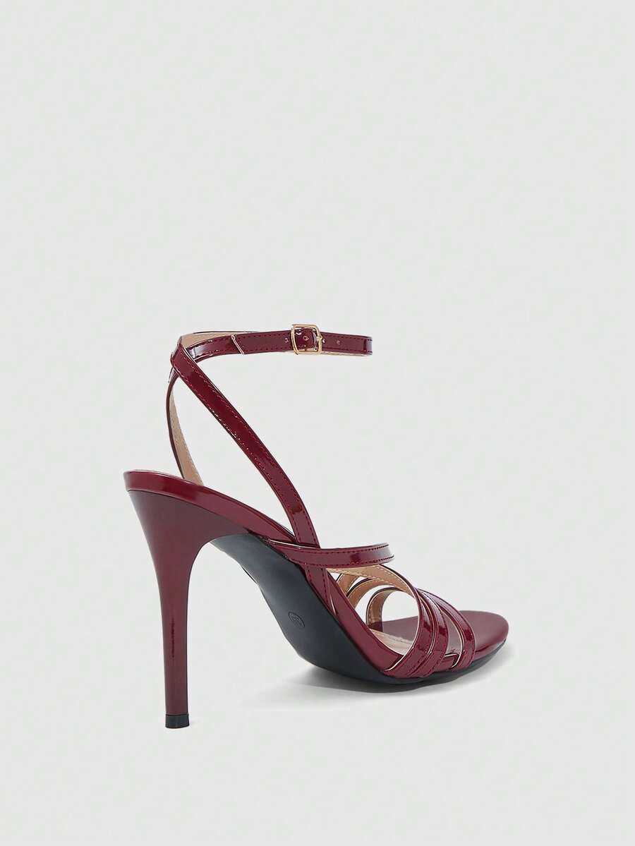 Women's square toe high heel sandals featuring crystal embellishments and crossover ankle straps with buckle closure