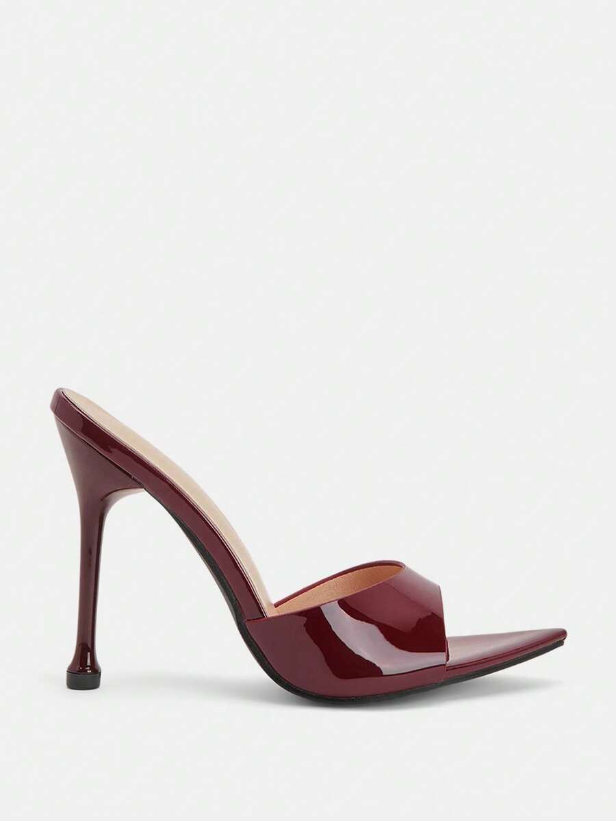 Pointed toe bowknot stiletto high heel mule sandals in white featuring a sleek slip-on open back design