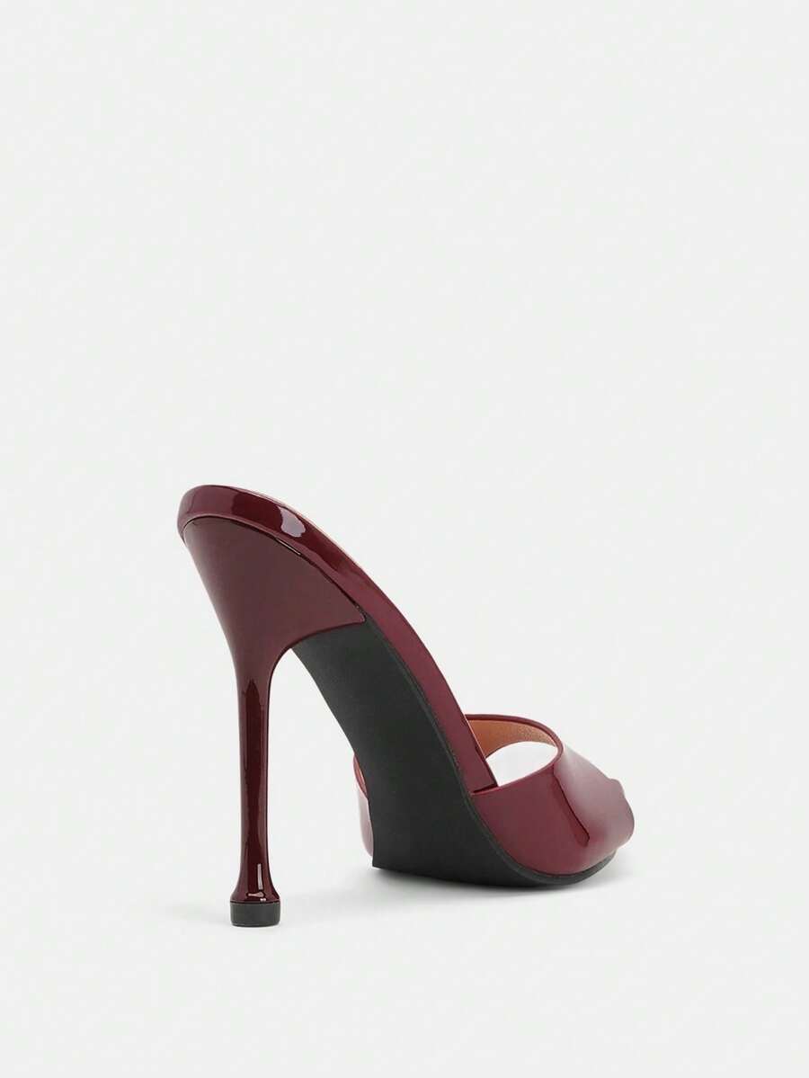 Pointed toe bowknot stiletto high heel mule sandals in white featuring a sleek slip-on open back design