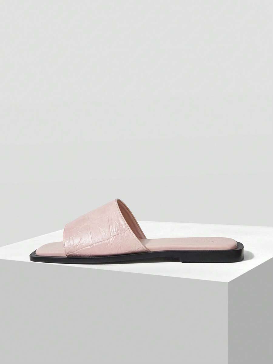 Retro women's square toe open toe flat slippers featuring a smooth PU leather finish and lightweight slip-on design.