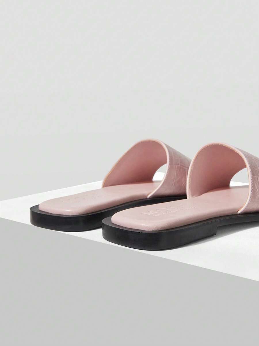 Retro women's square toe open toe flat slippers featuring a smooth PU leather finish and lightweight slip-on design.