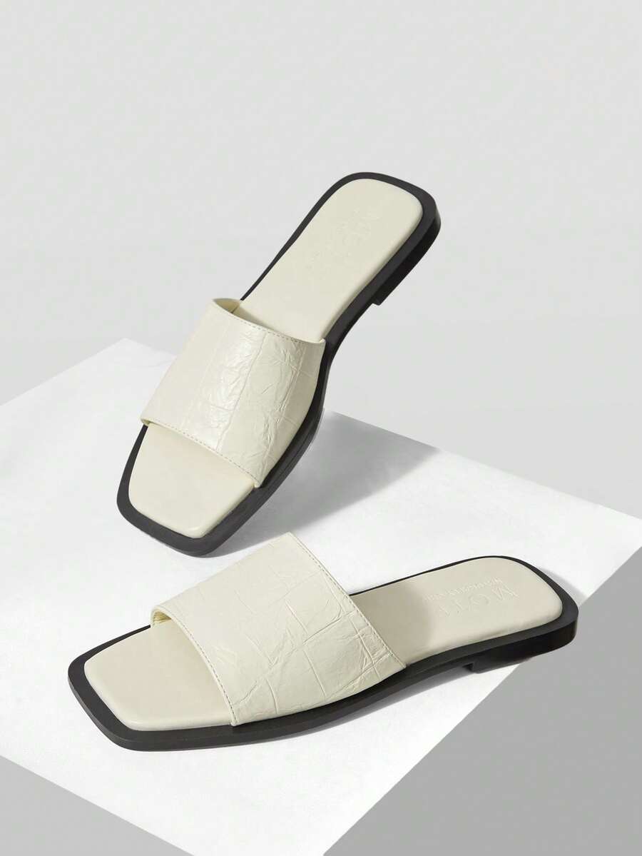 Retro women's square toe open toe flat slippers featuring a smooth PU leather finish and lightweight slip-on design.