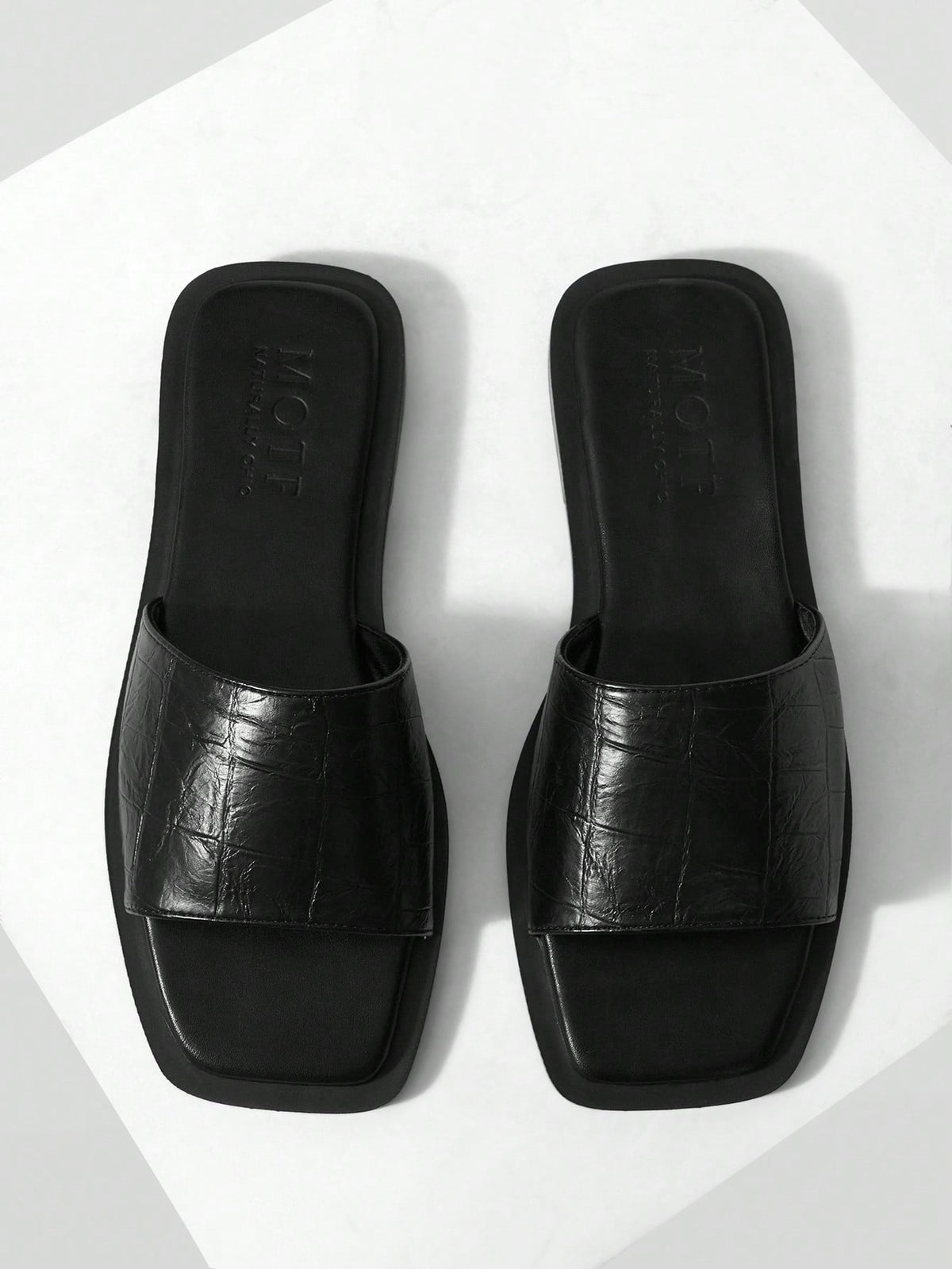 Retro women's square toe open toe flat slippers featuring a smooth PU leather finish and lightweight slip-on design.