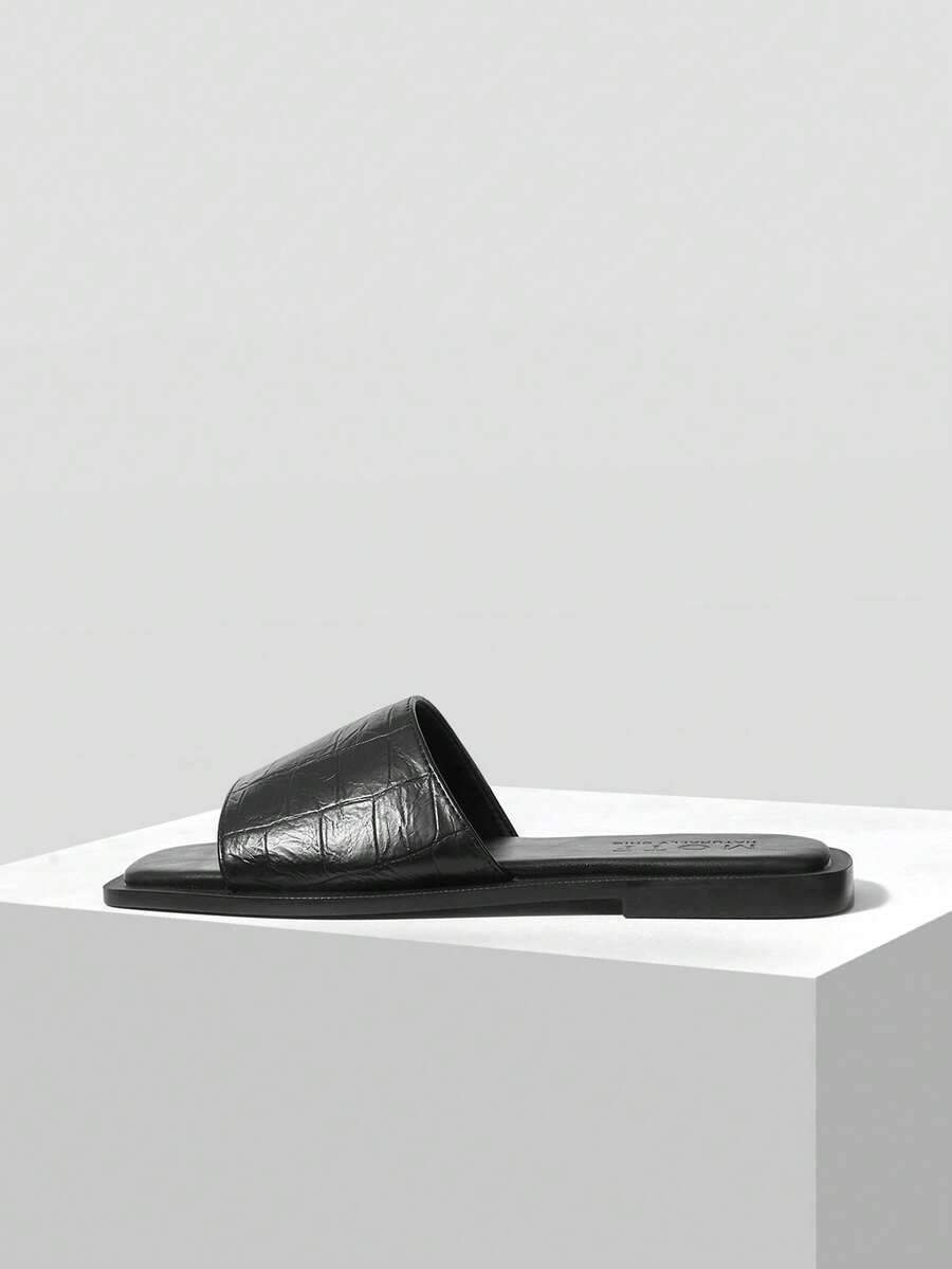 Retro women's square toe open toe flat slippers featuring a smooth PU leather finish and lightweight slip-on design.