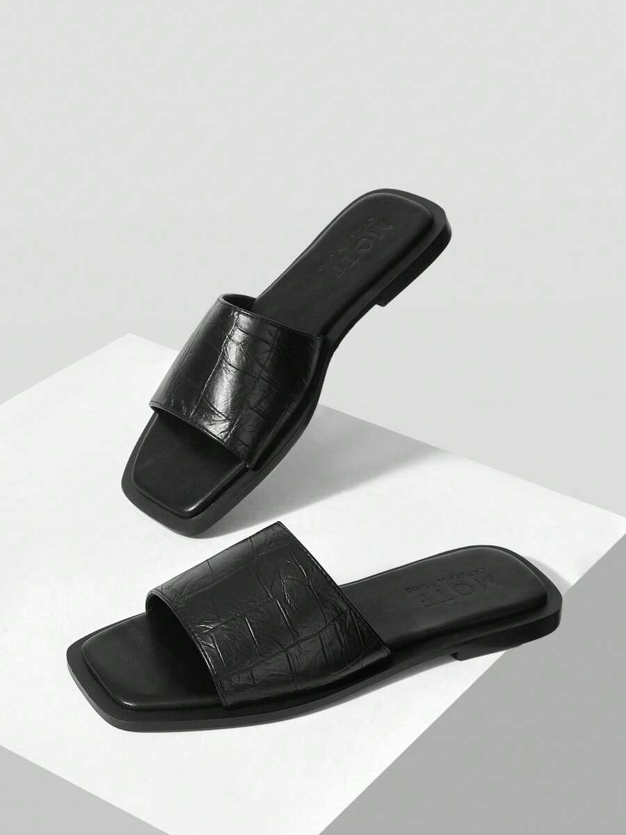 Retro women's square toe open toe flat slippers featuring a smooth PU leather finish and lightweight slip-on design.