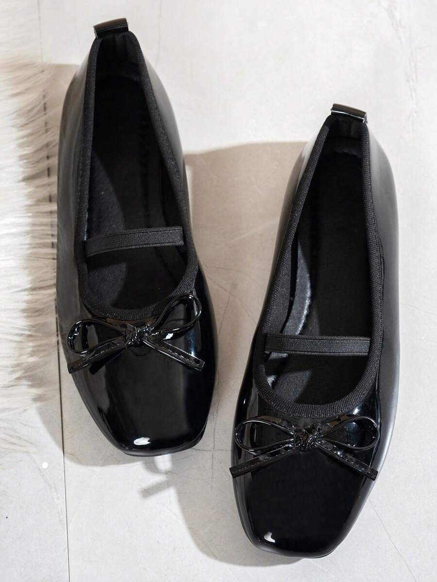 Square toe ballet flat shoes with bow detail and slip-on wide fit design.