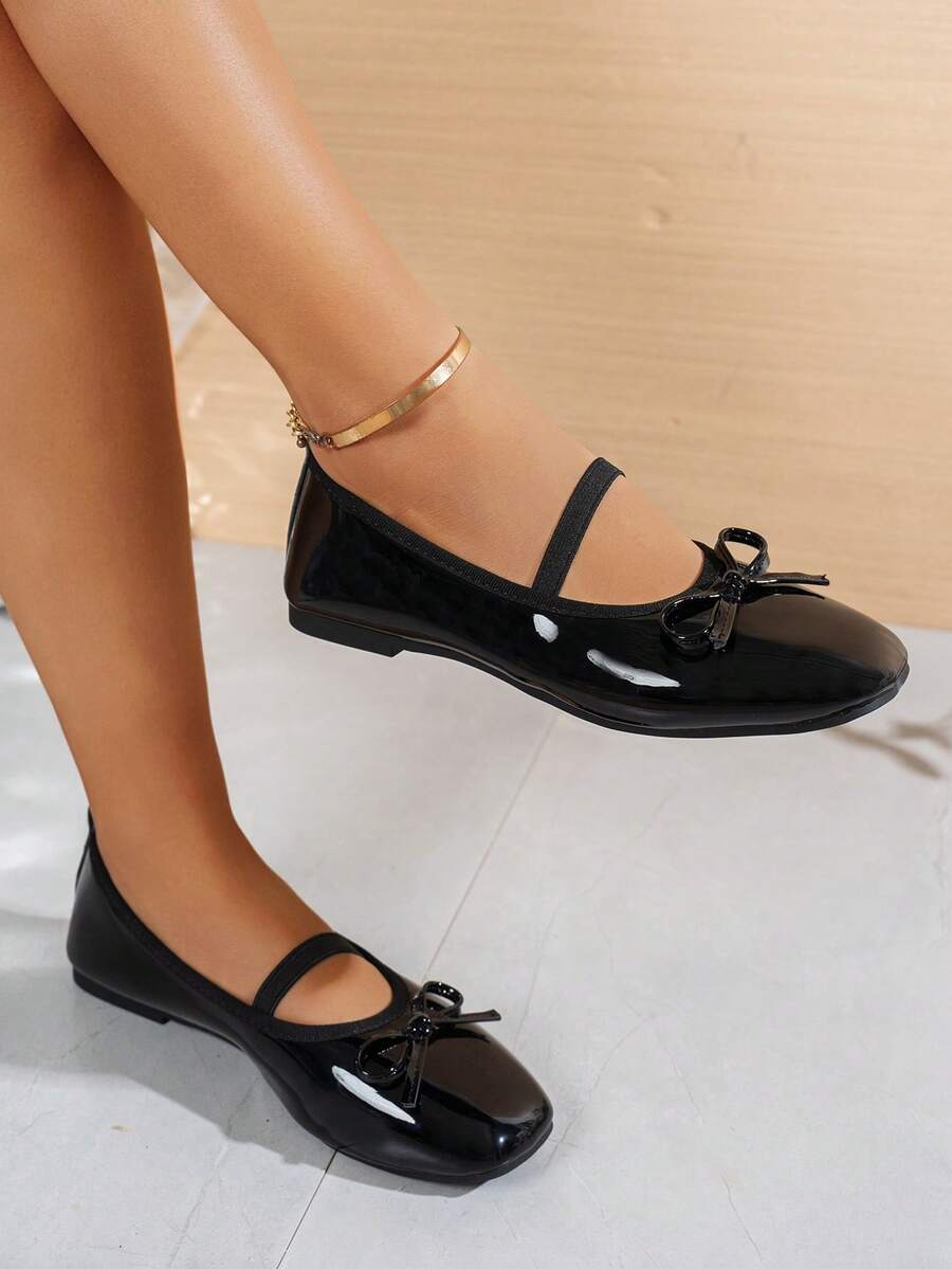 Square toe ballet flat shoes with bow detail and slip-on wide fit design.