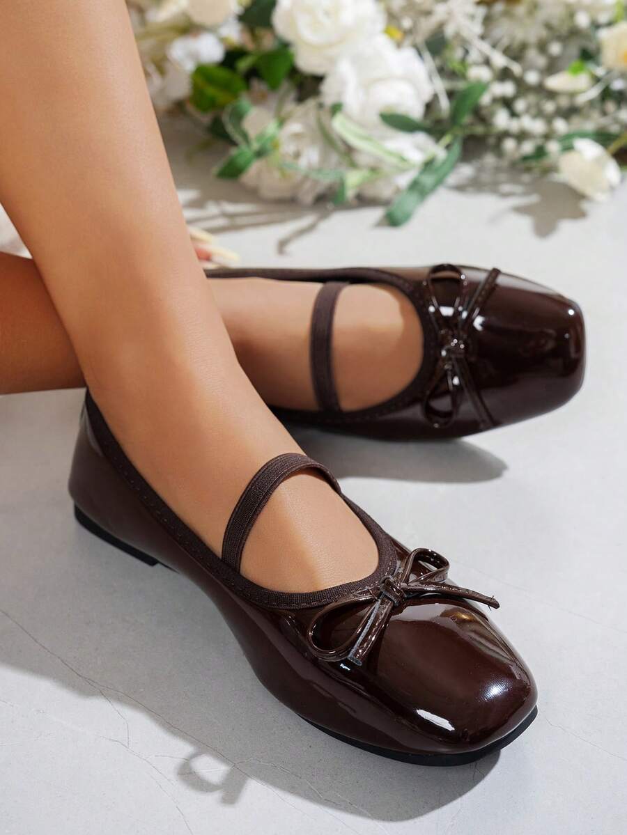 Square toe ballet flat shoes with bow detail and slip-on wide fit design.