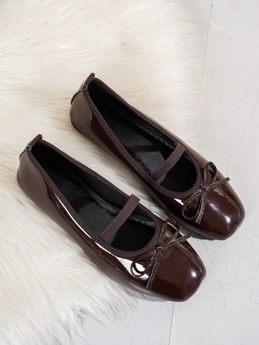 Square toe ballet flat shoes with bow detail and slip-on wide fit design.