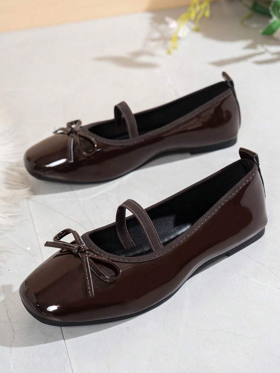 Square toe ballet flat shoes with bow detail and slip-on wide fit design.