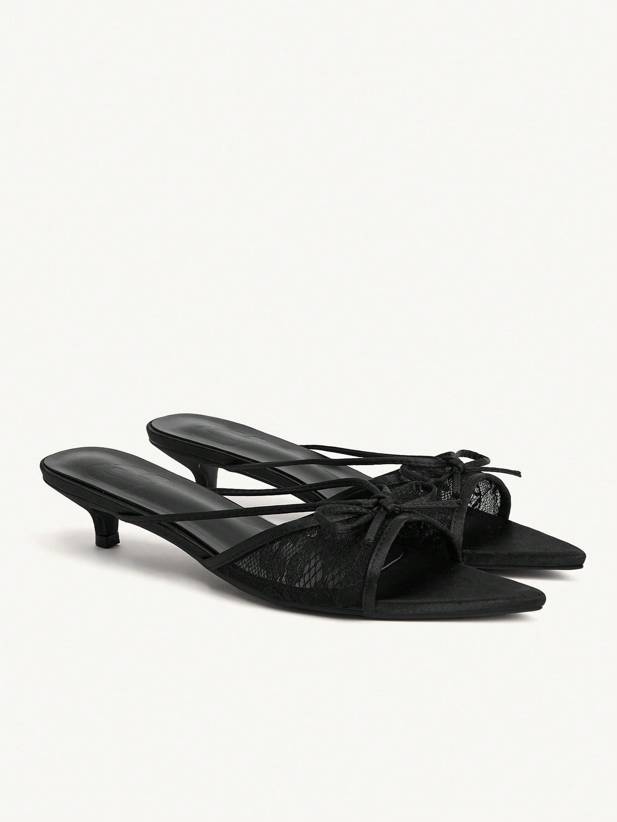 Pointed toe high-heeled slippers in PU leather with decorative buckle detail and low kitten heels for women.