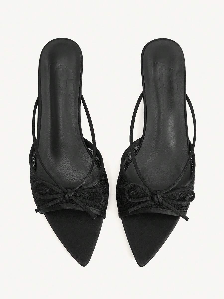 Pointed toe high-heeled slippers in PU leather with decorative buckle detail and low kitten heels for women.