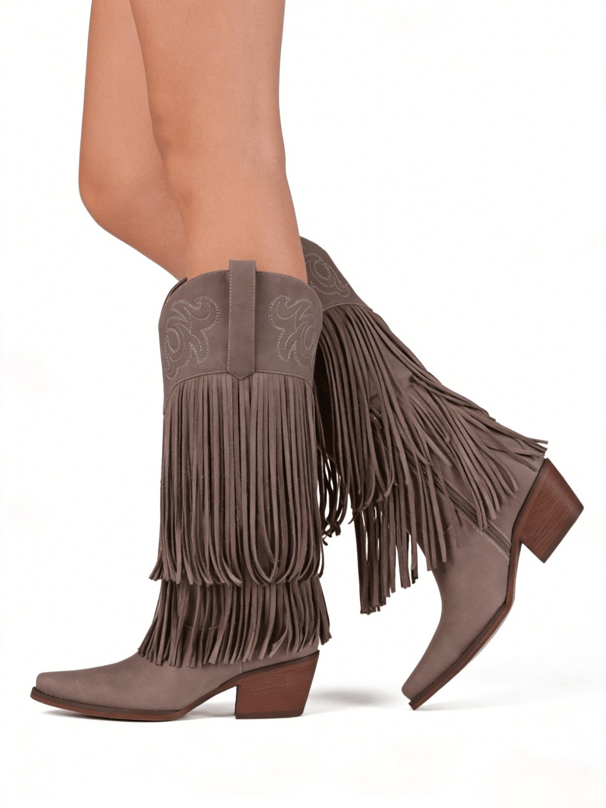 Women's camel suedette knee high western cowgirl boots featuring sparkling rhinestone fringe accents, a pointed toe, and a chunky block heel.