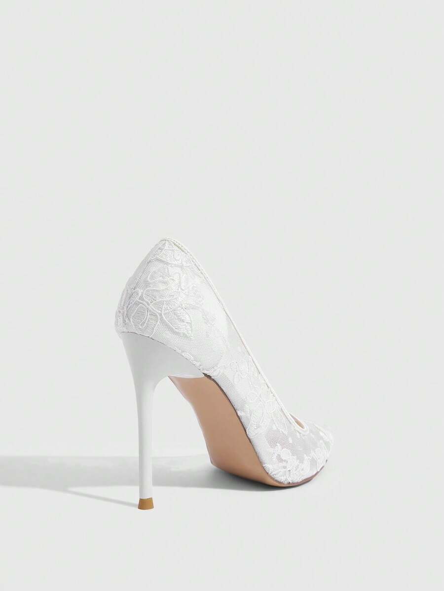 Women's pointed clear lace heels with contrast mesh, floral embroidery, and stiletto high heel with buckle strap.