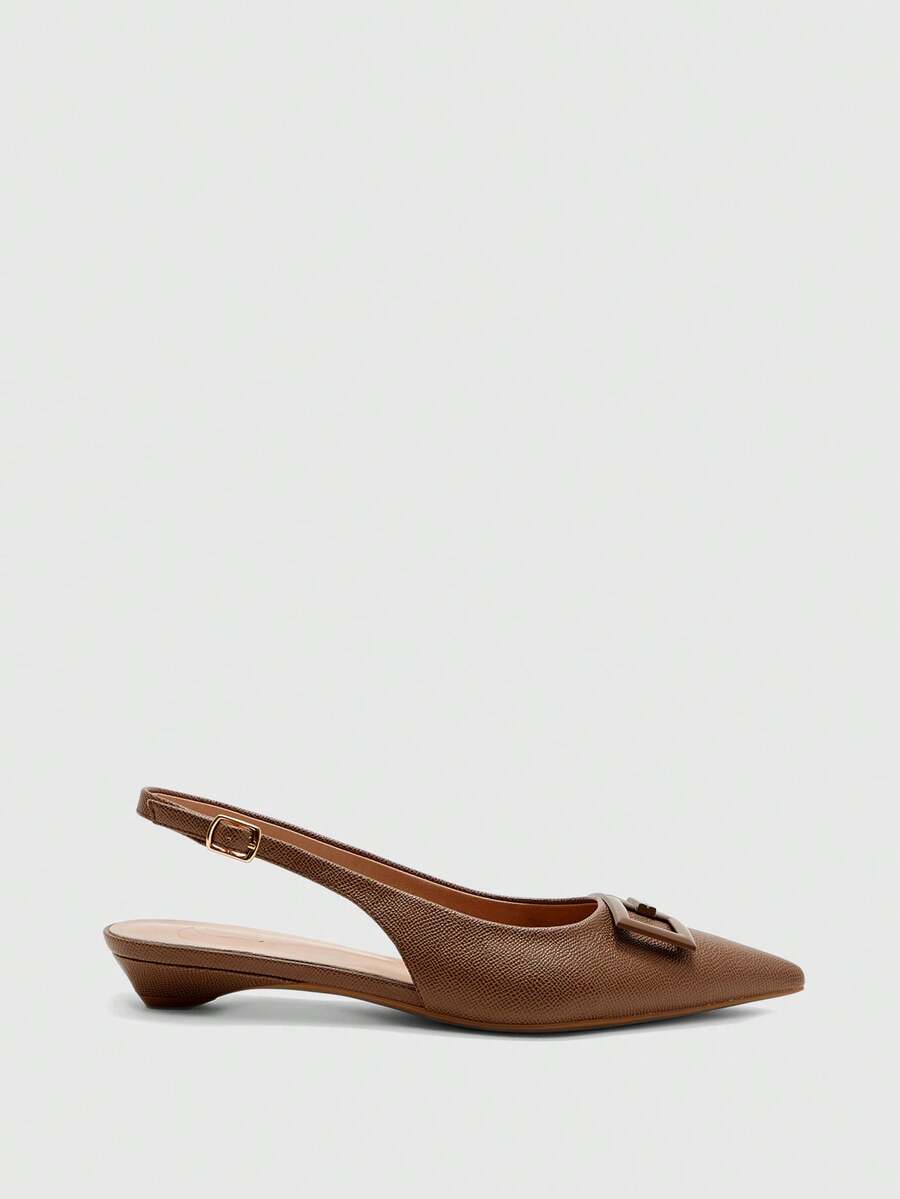 Women's pointed toe low wedge flat shoes crafted in PU leather with a slingback strap and stylish metal buckle detail.