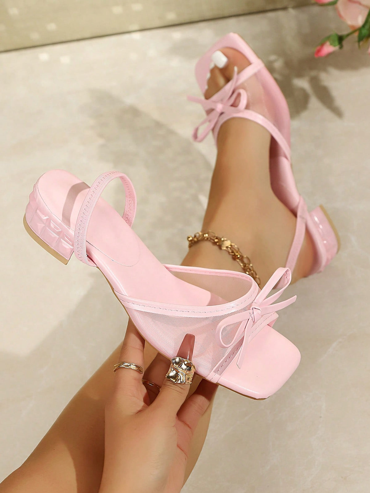 Square toe thin heel thong sandals for women featuring an open toe, bowknot detail, and slip-on slingback design.