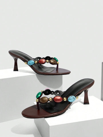 Elegant ladies strappy high-heeled slippers featuring a sleek toe post, buckle accent, and stiletto mid heel in smooth PU leather.
