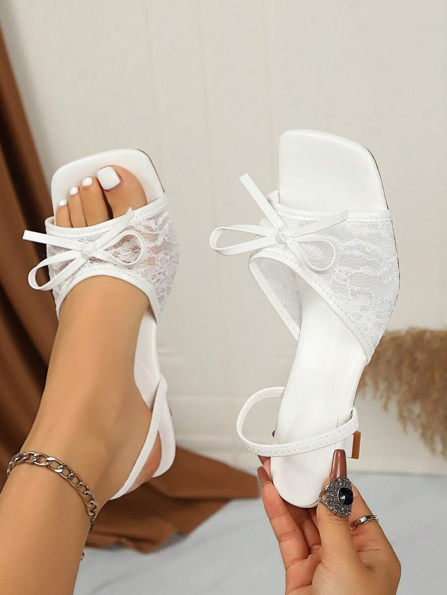 Square toe thin heel thong sandals for women featuring an open toe, bowknot detail, and slip-on slingback design.