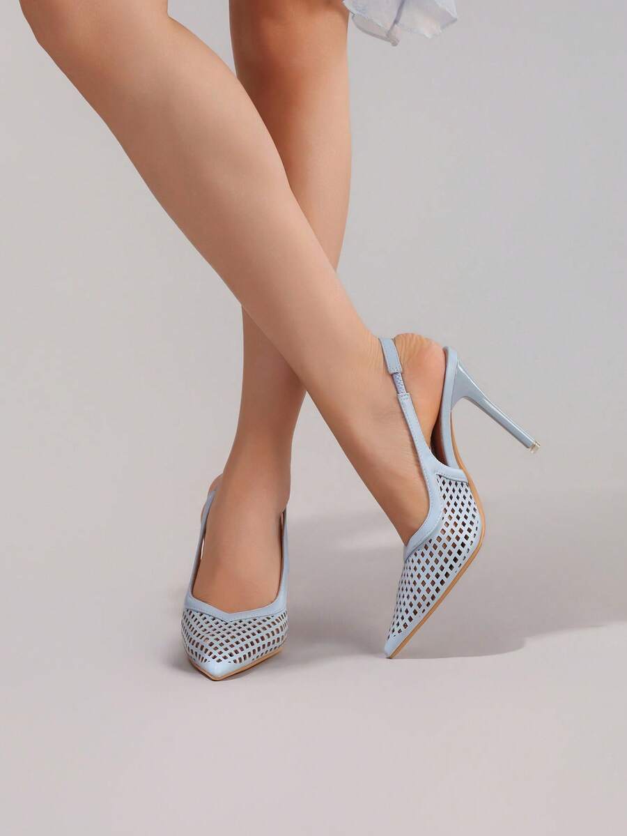 Lace embroidered high heels with thin stiletto heel, pointed toe, rhinestone embellishments, and ankle strap buckle closure.