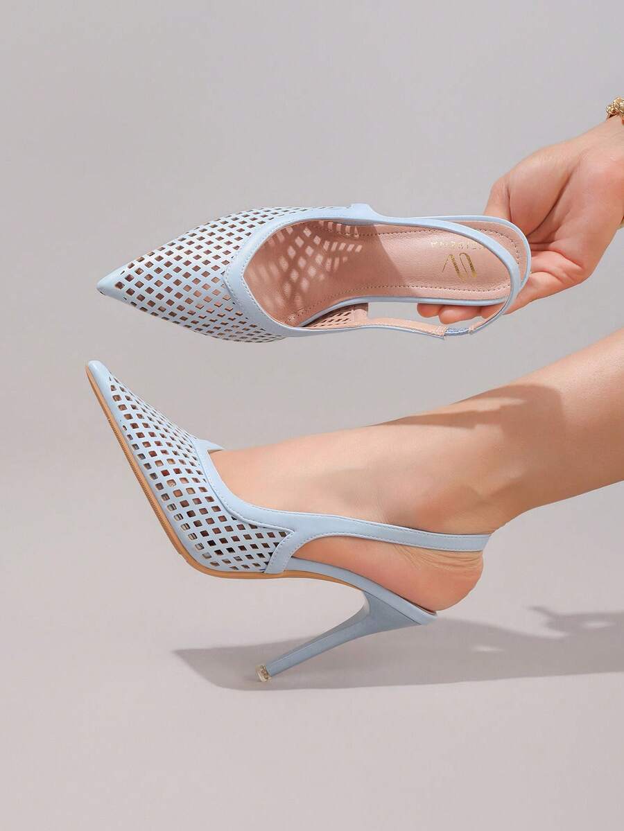 Lace embroidered high heels with thin stiletto heel, pointed toe, rhinestone embellishments, and ankle strap buckle closure.