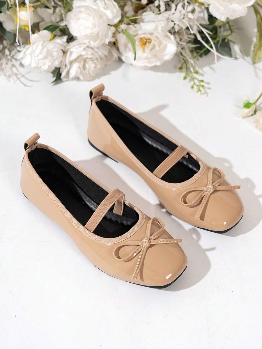 Square toe ballet flat shoes with bow detail and slip-on wide fit design.