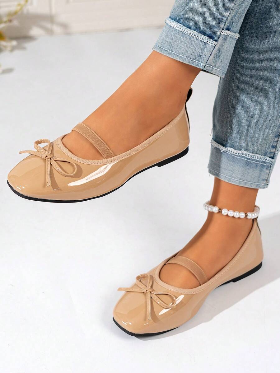 Square toe ballet flat shoes with bow detail and slip-on wide fit design.