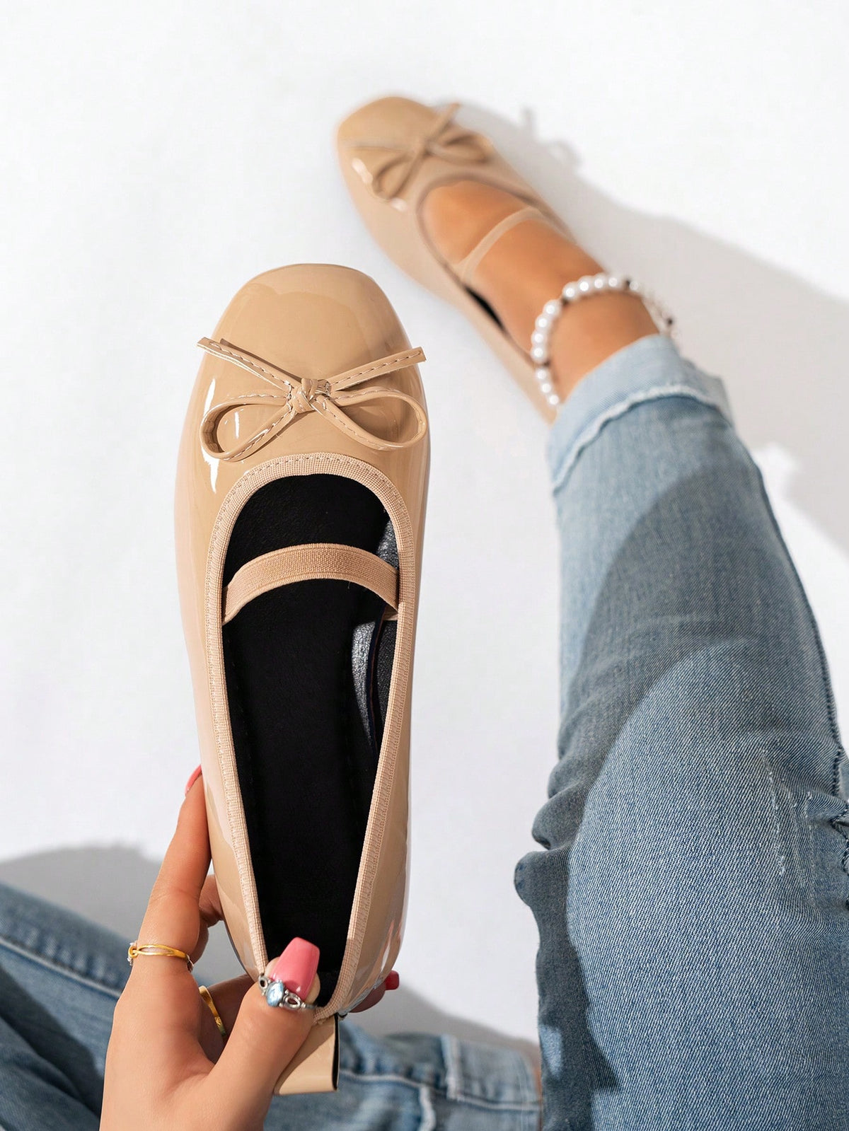 Square toe ballet flat shoes with bow detail and slip-on wide fit design.